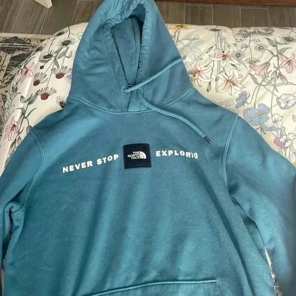 The north face never stop exploring hoodie